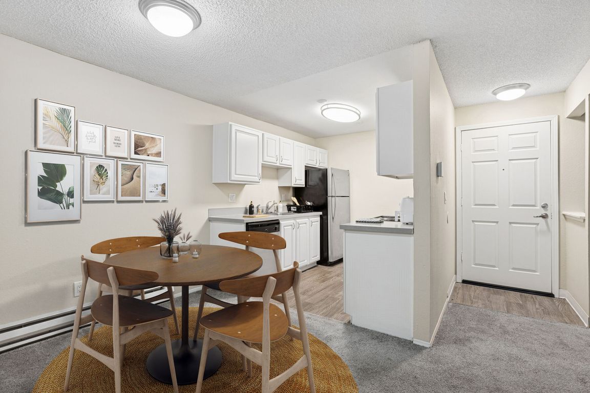 Make-ready apartment kitchen and dining area